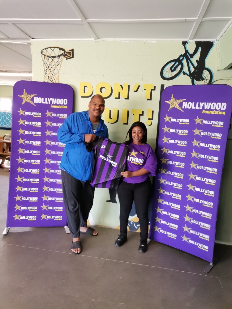 hollywoodfoundation-1. Representative from Hollywood Foundation and Kensington AFC with the contributionKensington AFC receives a soccer sponsorship from the Hollywood FoundationHollywoodbets iBranch MASTER