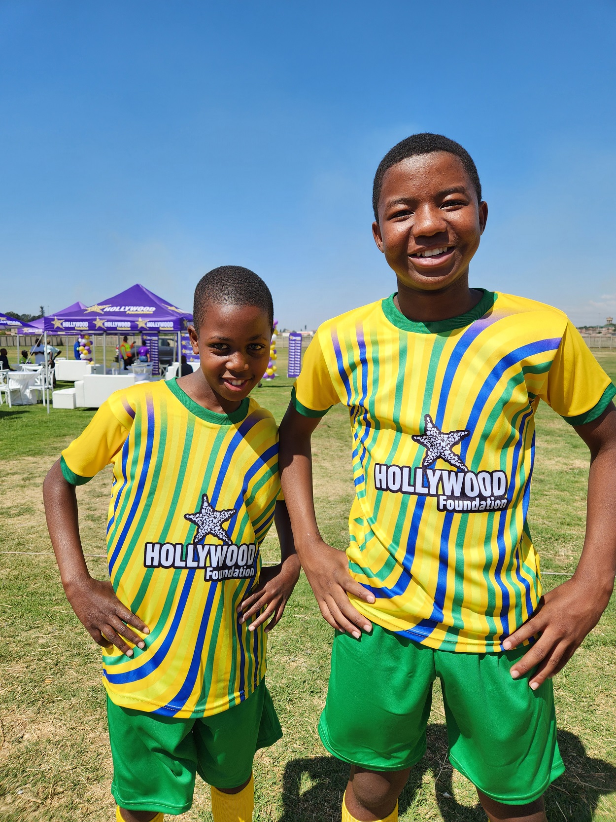 Hollywood Foundation Team Members handing over sports kits to club members and management