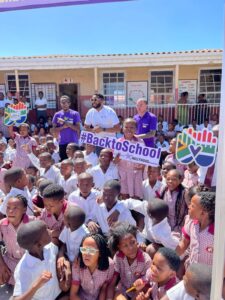 School kids receiving school equiptment
