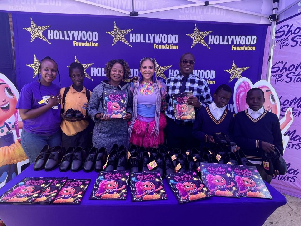 hollywoodfoundation-3. Representatives from Hollywood Foundation learners from the school and Sho Madjozi min 7Sho Madjozi and Hollywood Foundation partner for the Back to School campaignHollywoodbets iBranch MASTER