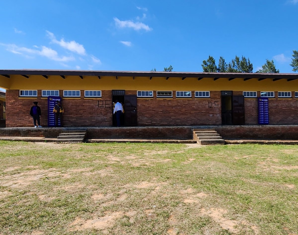 hollywoodfoundation-HWF representative and Lilanga Secondary School beneficiariesHollywood Foundation’s Corporate Social Investment (CSI) Initiatives Brighten the Future for Lilanga Secondary SchoolCorporate Social Investment Programme