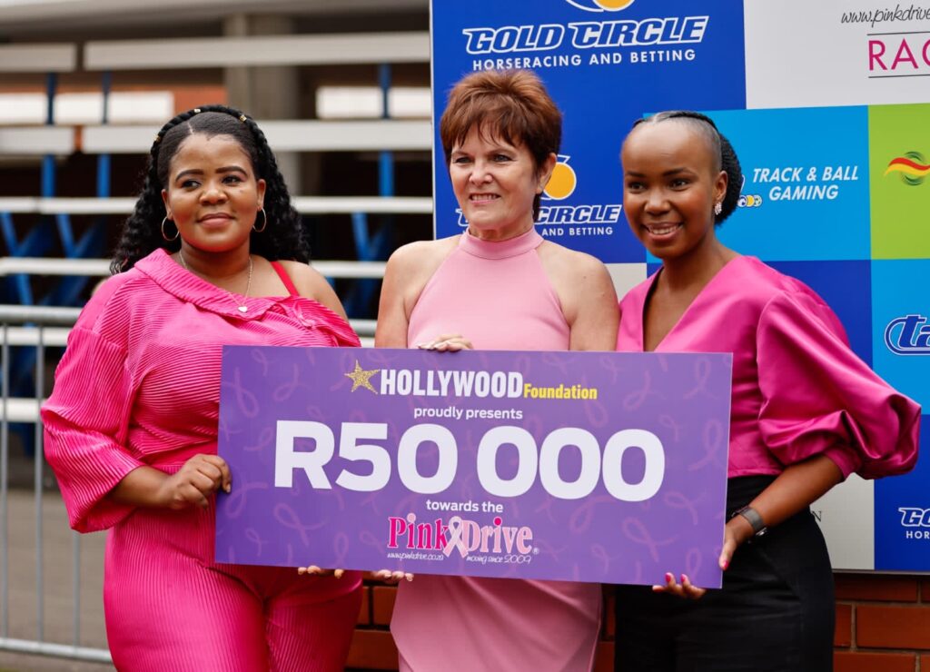 hollywoodfoundation-Hollywood Foundations Team Members handing over a contribution to Pink Drives Marketing and Events Co ordinator Janice BeneckThe Hollywood Foundation supports the PinkDrive as part of a Corporate Social Investment initiativeHorse Racing Sponsorship