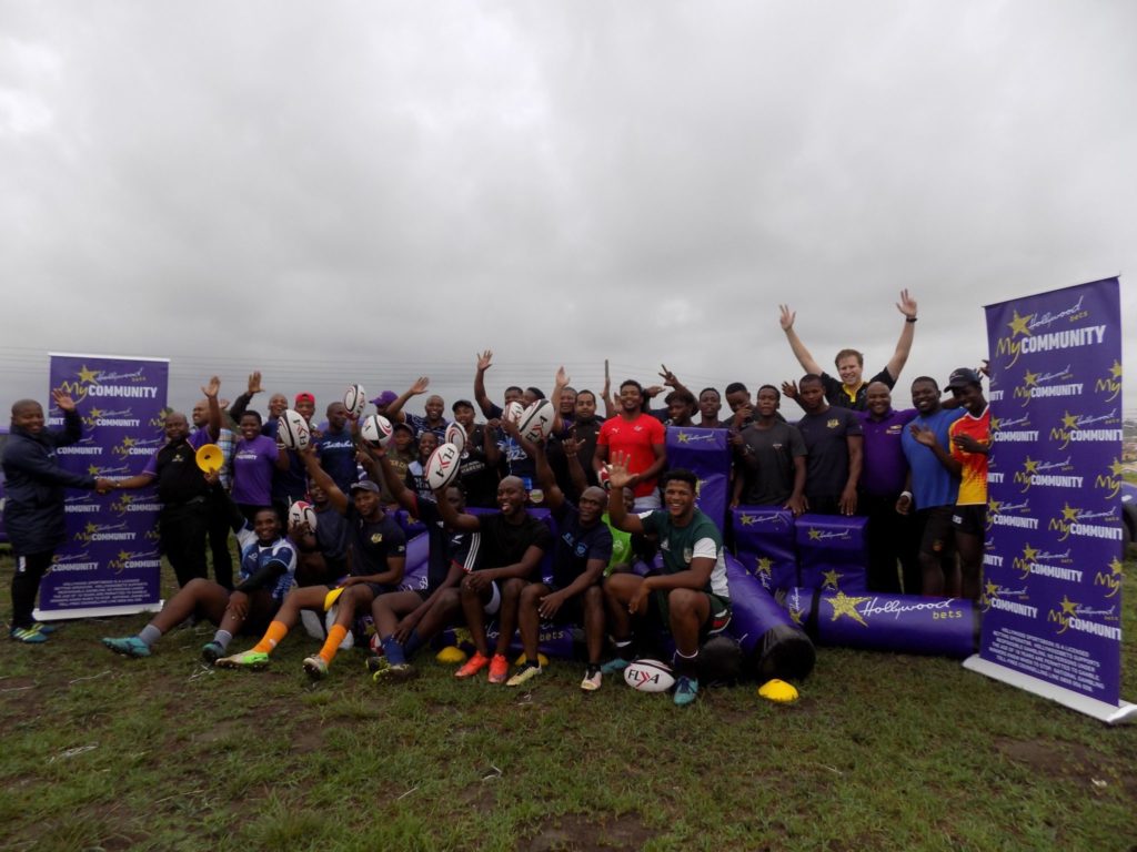 Swallows Rugby Club receives a donation from Hollywoodbets
