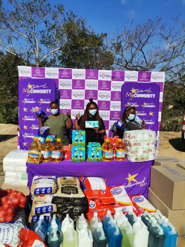 South African Positive Women Ambassadors receiving their donation from Hollywoodbets