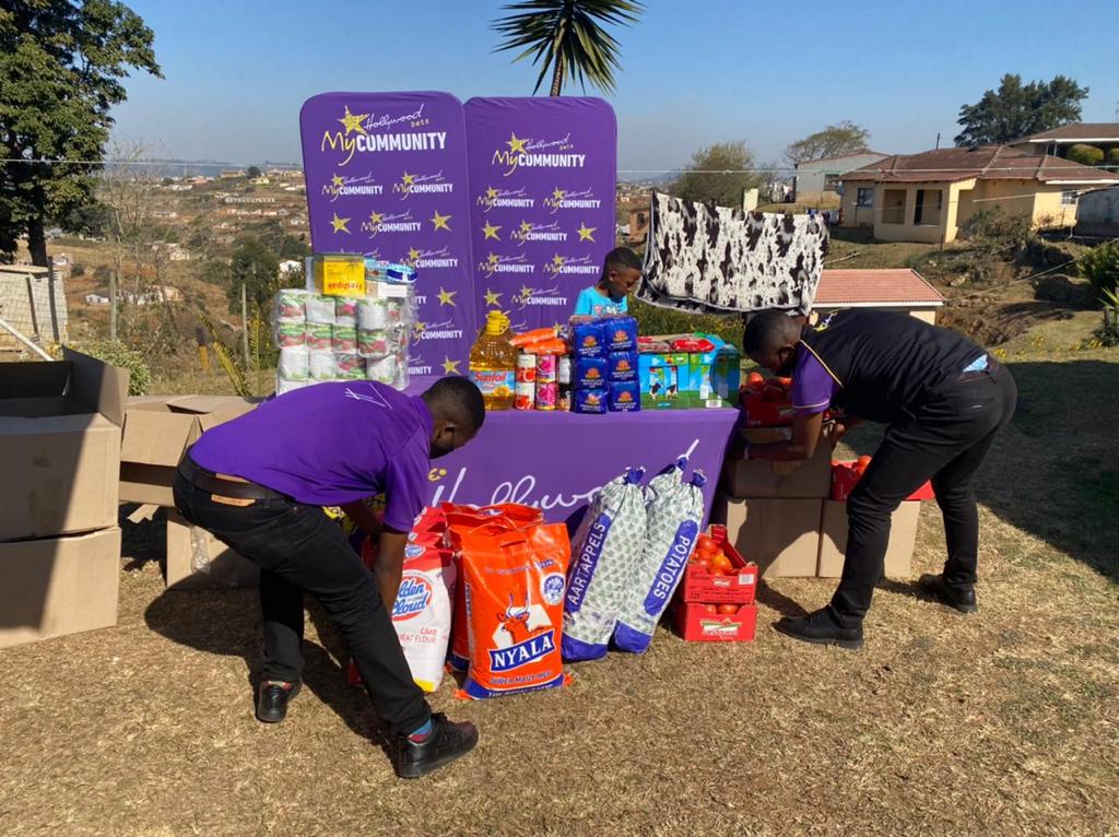 Sizanokuhle donation being packed by Hollywoodbets team
